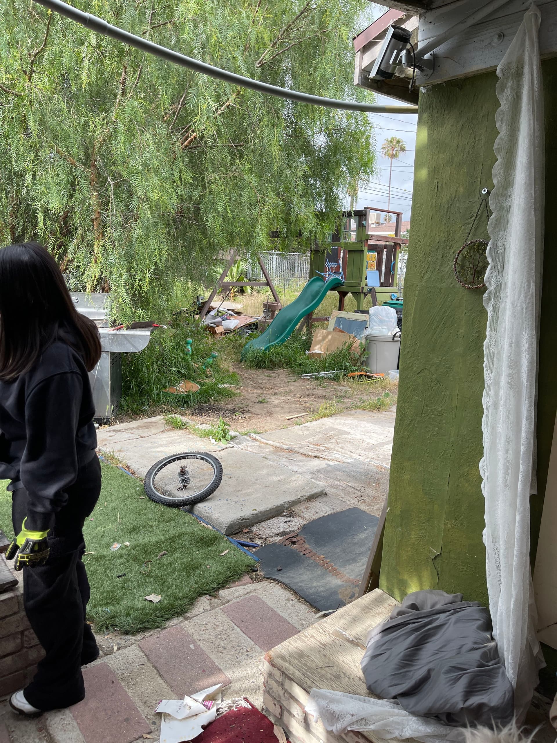 Gallery photos for Backyard Cleanout Goes From Cluttered and Overgrown to Open Space: Image #2