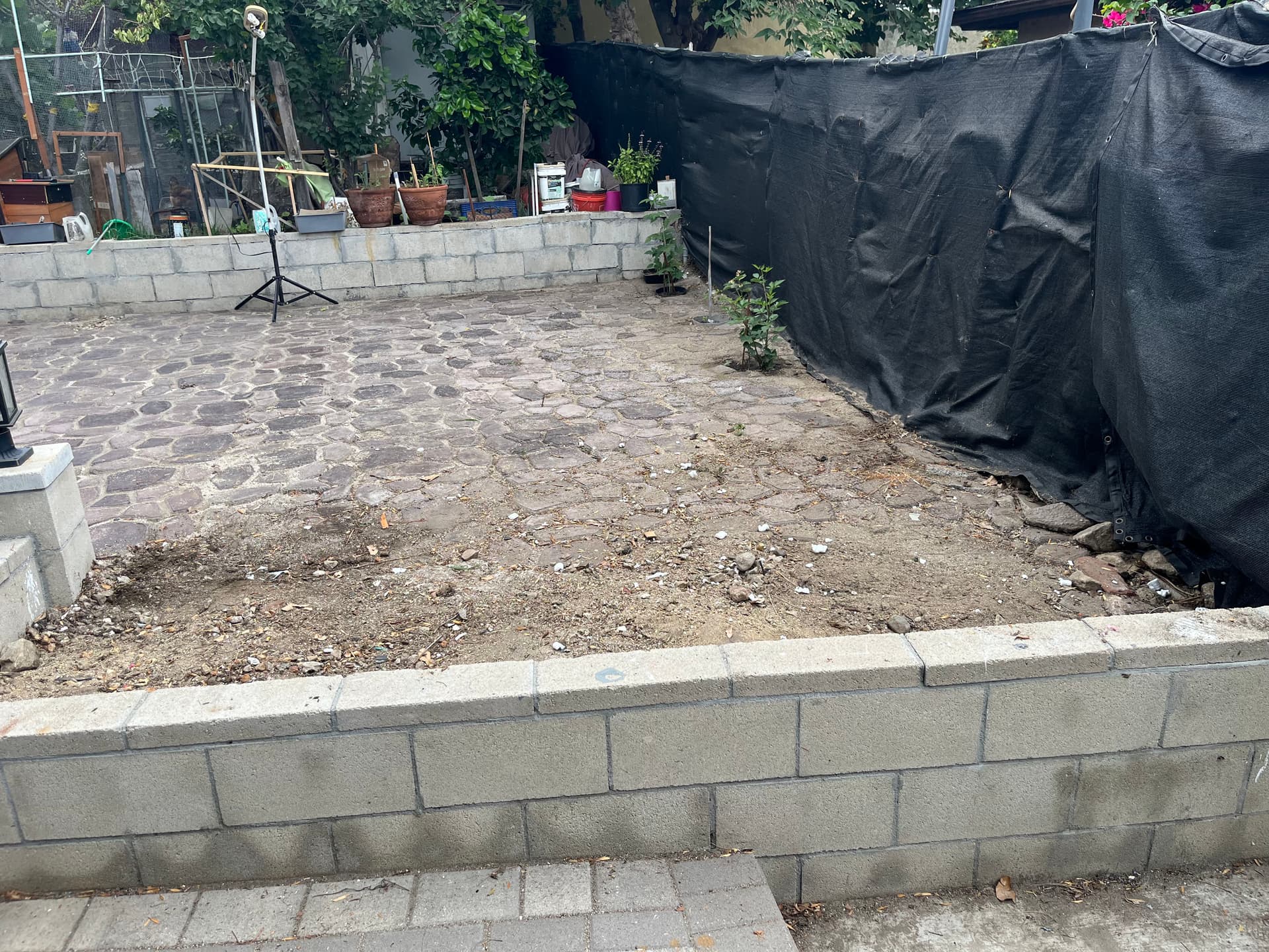 Gallery photos for Massive Junk Pile Cleared From a Residential Outdoor Space: Image #1