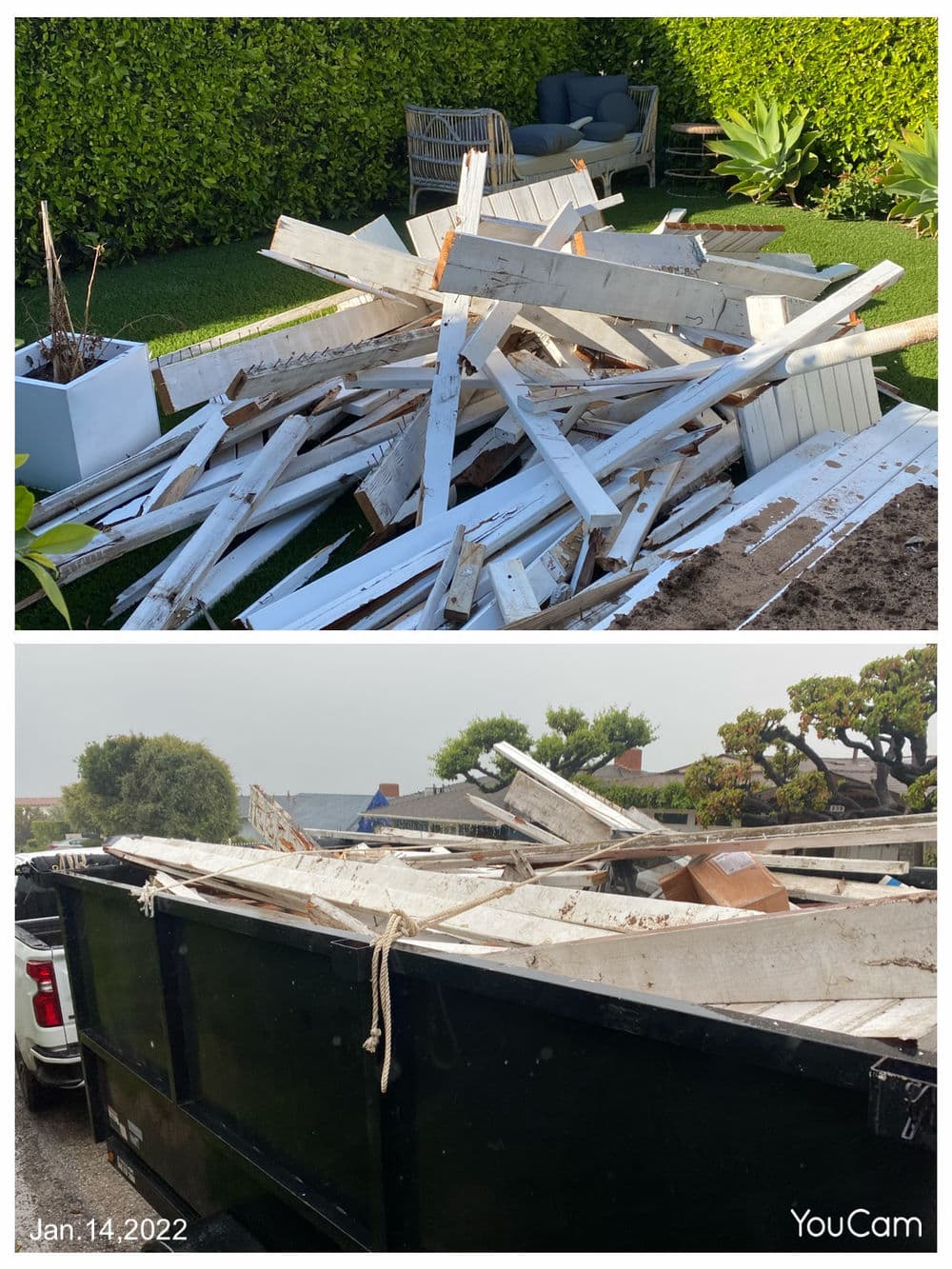 Debris pile from demolition in yard, ready for disposal in dumpster truck. Jan. 14, 2022.